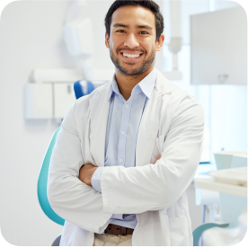 Friendly certified specialist dentist in white lab coat at Dentrist clinic
